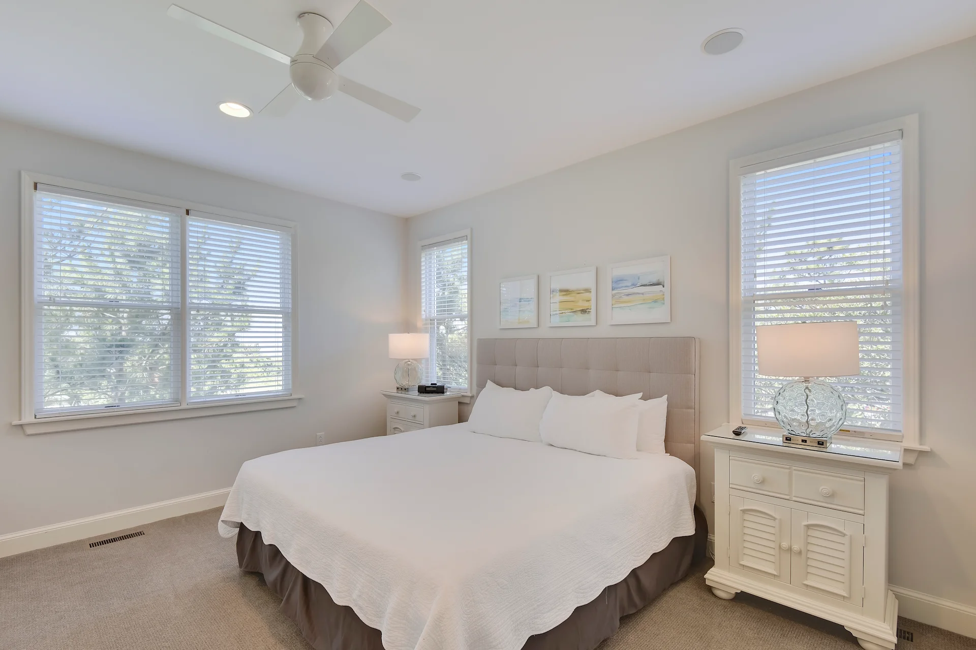 Bedroom with a spacious king-size bed in the Harris 3 Bedroom Residence, offering a comfortable and stylish retreat